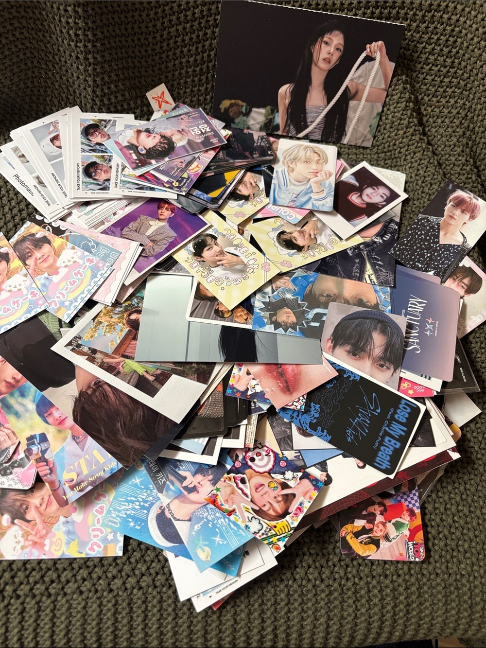 K-pop collectible photocards and polaroids